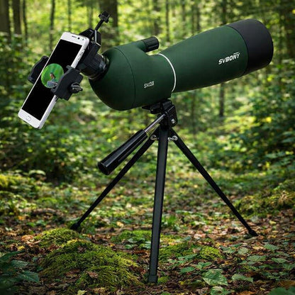 jumelles avec telephone en foret