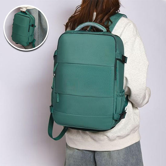 sac a dos de voyage vert porte par femme